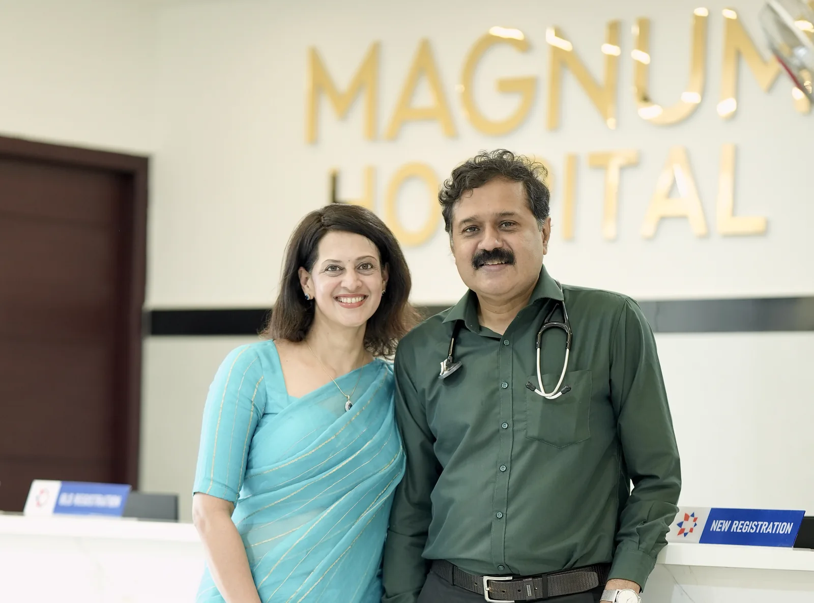 Dr. Veena Choodamani and Dr. Mahadevan R, founders of Magnum Hospital, at the hospital reception